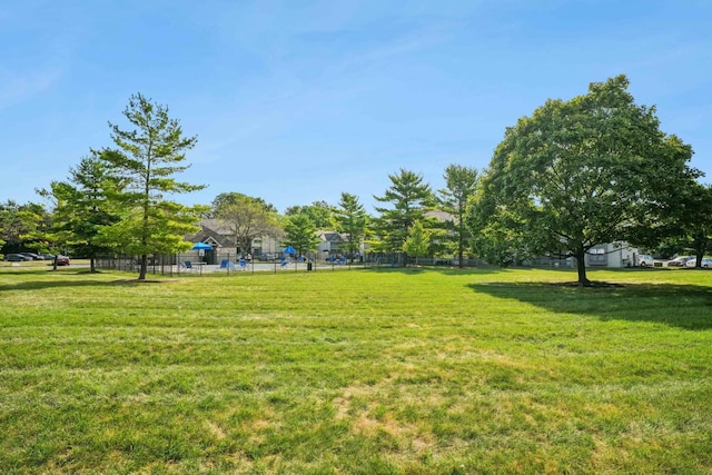 view of community with a lawn