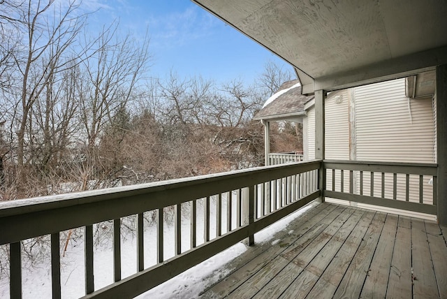 view of snow covered deck