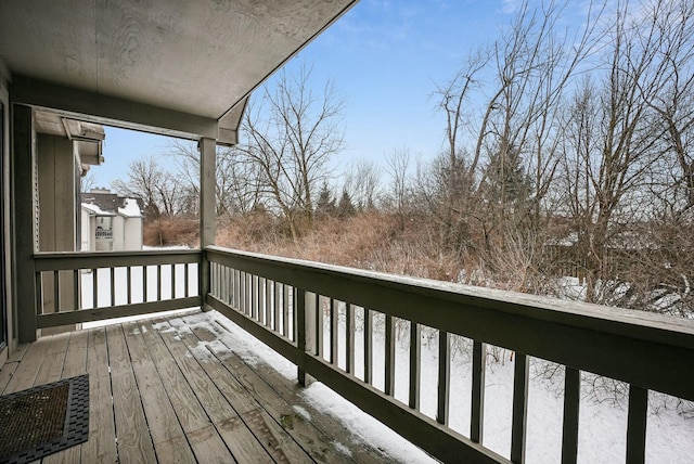 view of snow covered deck