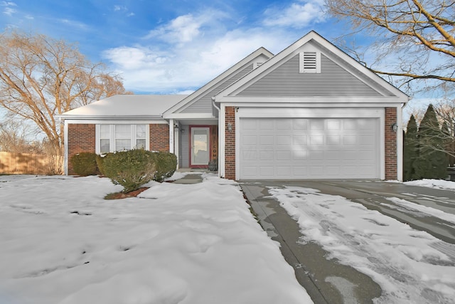 view of front of home with a garage