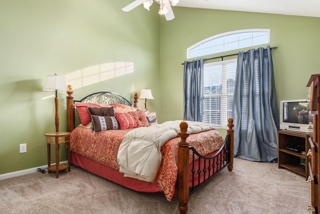 bedroom featuring ceiling fan and light carpet