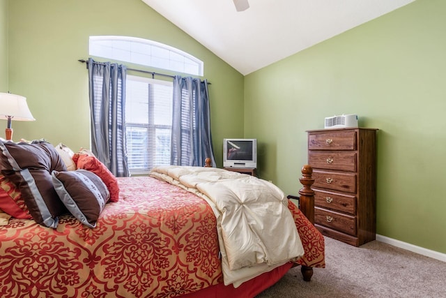 carpeted bedroom featuring ceiling fan and lofted ceiling