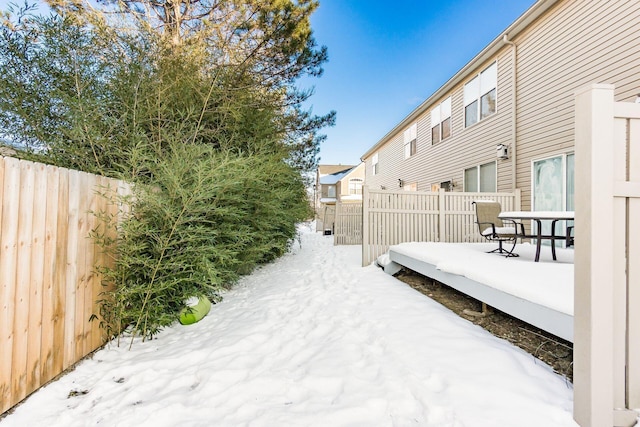 view of yard covered in snow