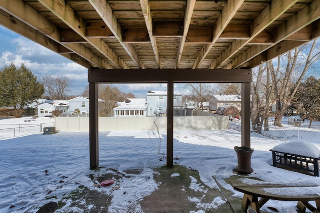 view of snow covered patio