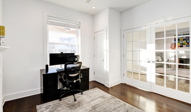 office space with french doors and dark wood-type flooring