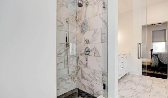 bathroom with an enclosed shower and vanity