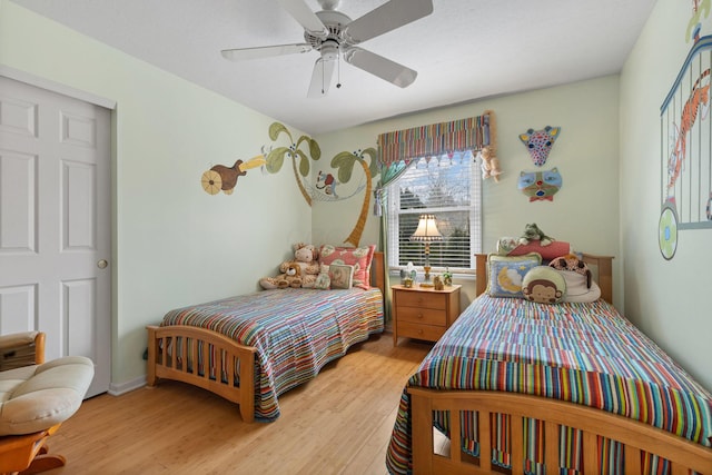 bedroom featuring ceiling fan and light wood finished floors