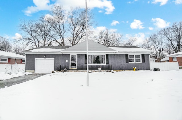 single story home with a garage