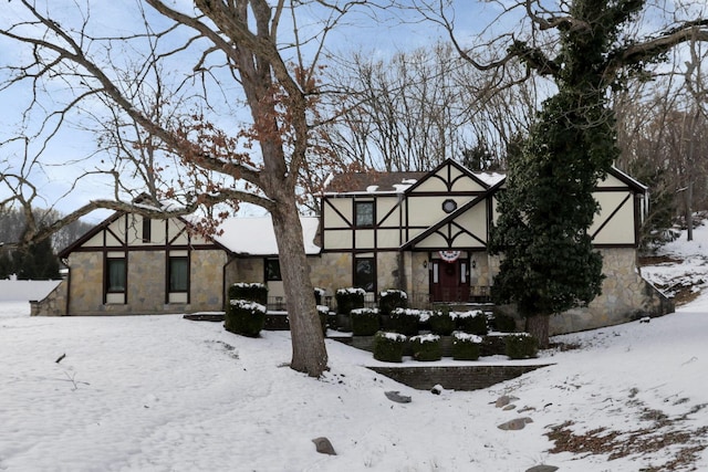 view of snow covered house