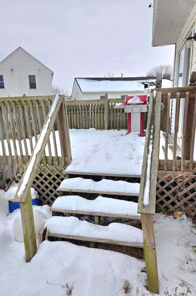 view of snow covered deck