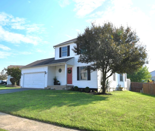 front of property featuring a garage and a front lawn