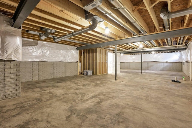 unfinished basement with brick wall