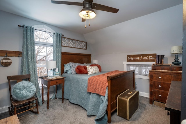 carpeted bedroom with lofted ceiling and ceiling fan