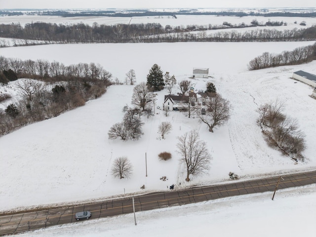 snowy aerial view with a rural view