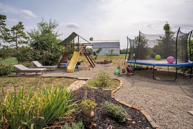 view of play area with a trampoline