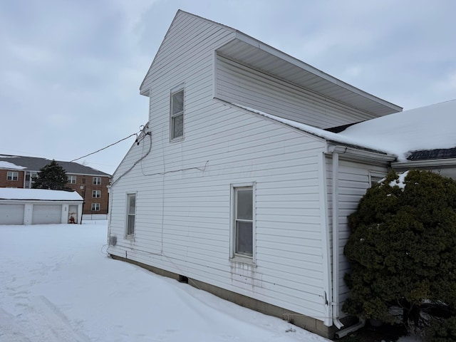 view of snow covered property