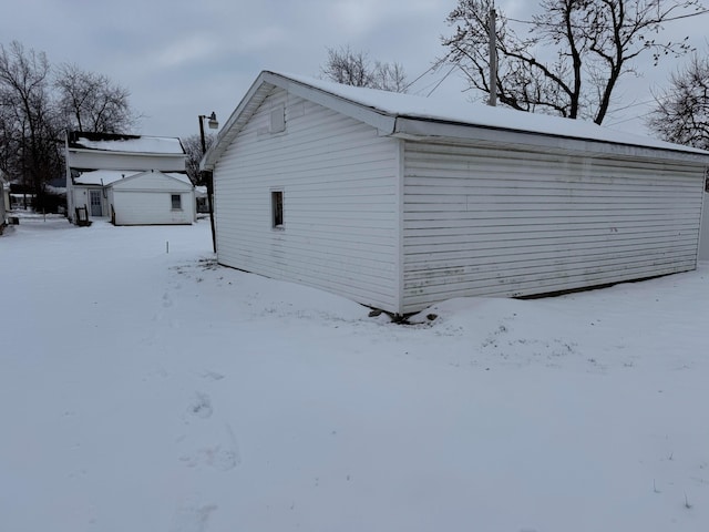 view of snow covered property