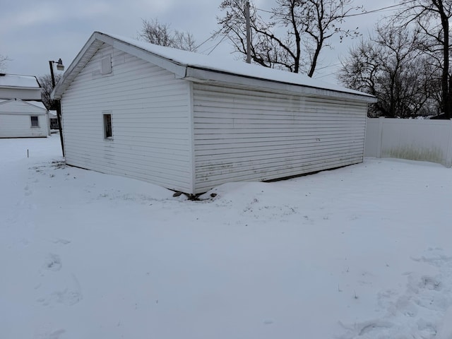 view of snow covered garage