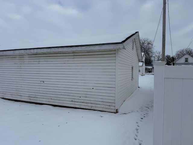 view of snow covered garage