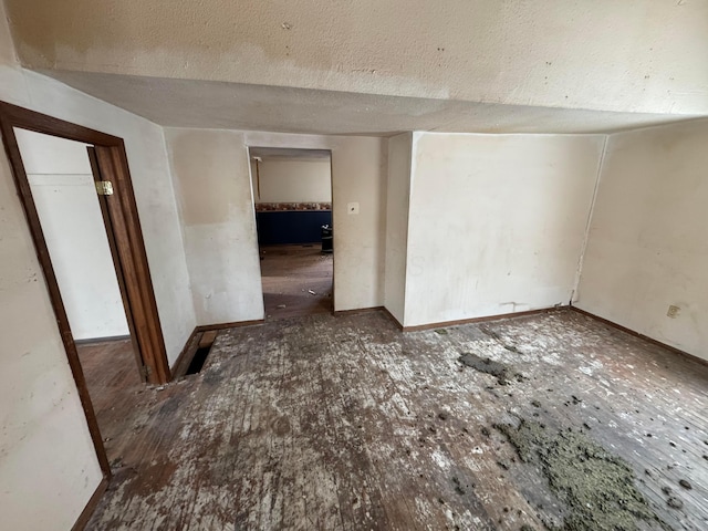 empty room featuring a textured ceiling