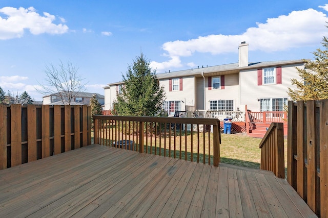 wooden deck with a yard