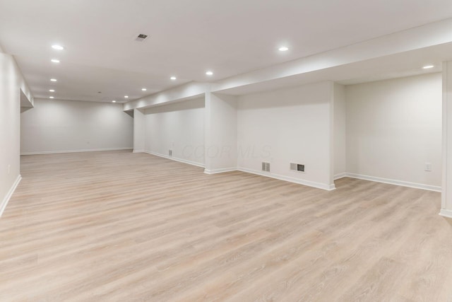 basement with light wood-type flooring