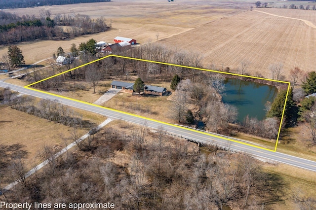 birds eye view of property featuring a rural view