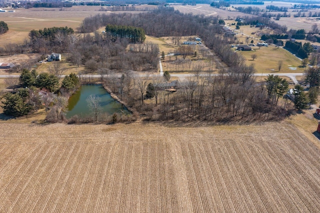 bird's eye view with a rural view and a water view