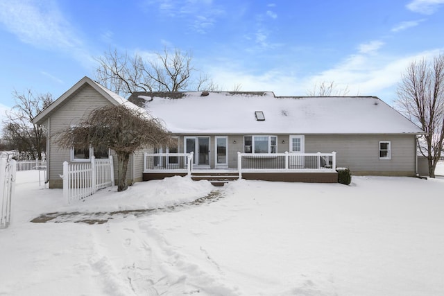 view of snow covered property