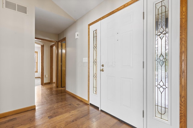 foyer with hardwood / wood-style floors