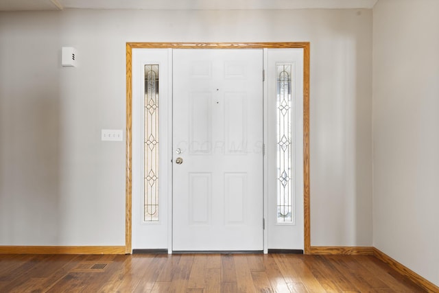 entrance foyer featuring hardwood / wood-style flooring