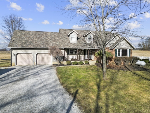 cape cod house with a garage, a front lawn, and a porch