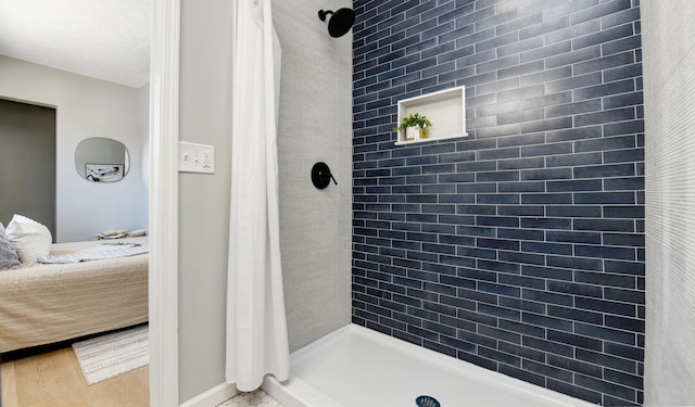 bathroom with curtained shower