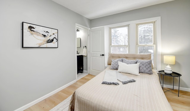 bedroom featuring light hardwood / wood-style flooring