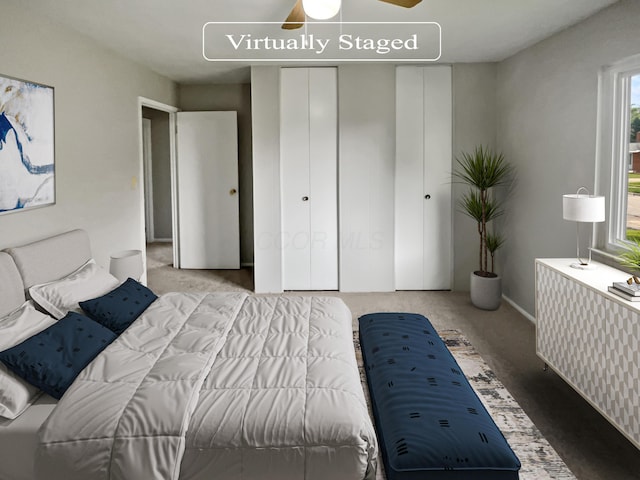 bedroom featuring light colored carpet and ceiling fan