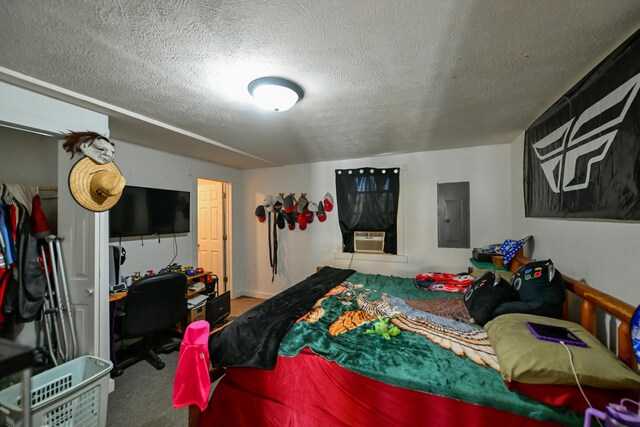 22 Fairlawn Ave, Glouster, OH 45732 - carpeted bedroom featuring electric panel and a textured ceiling