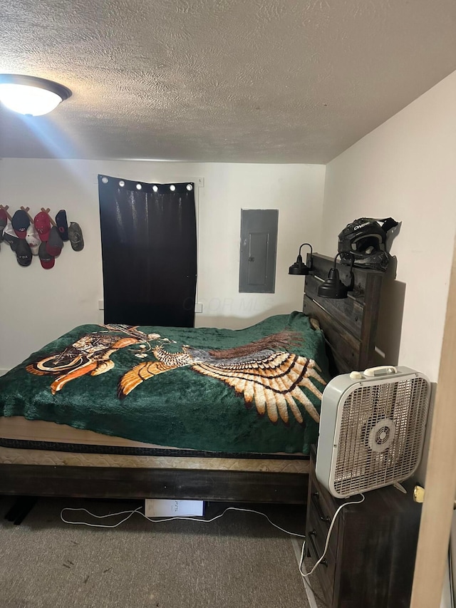 carpeted bedroom featuring a textured ceiling and electric panel