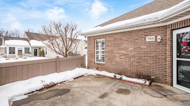 view of snow covered patio