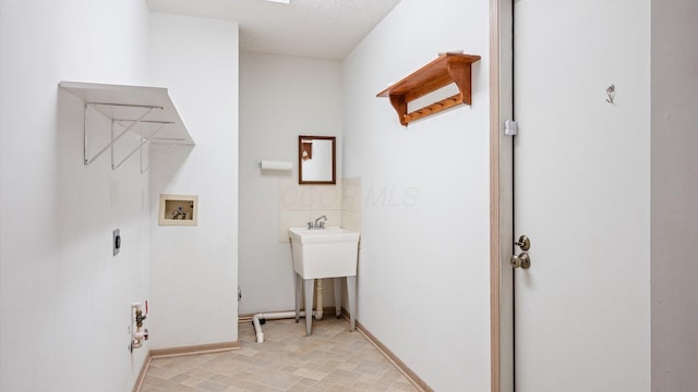 laundry room featuring washer hookup and hookup for an electric dryer