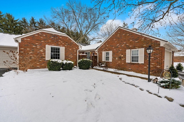 view of snow covered property