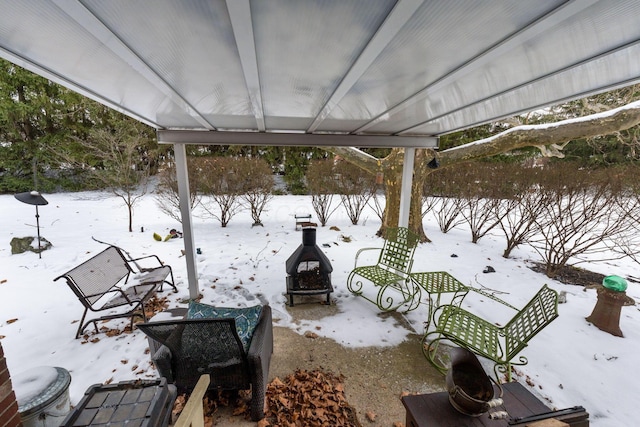 view of snow covered patio