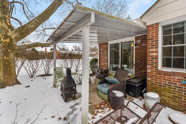 view of snow covered patio