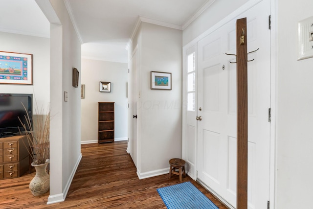 entrance foyer featuring dark wood-type flooring and crown molding