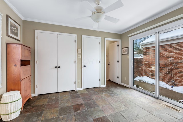 unfurnished bedroom featuring ceiling fan, access to exterior, a closet, and ornamental molding