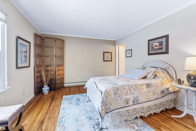 bedroom featuring hardwood / wood-style floors, crown molding, and a baseboard radiator