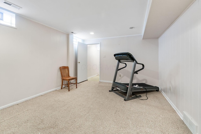 exercise room with carpet flooring