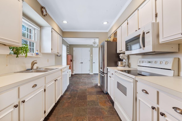 kitchen featuring white cabinetry, ceiling fan, white appliances, crown molding, and sink