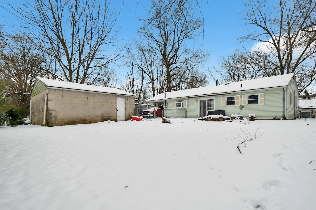 view of snow covered house