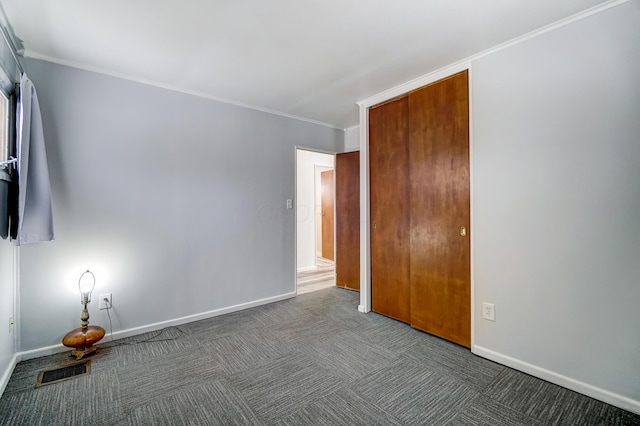 unfurnished bedroom with ornamental molding