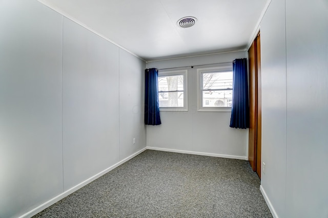 spare room with carpet